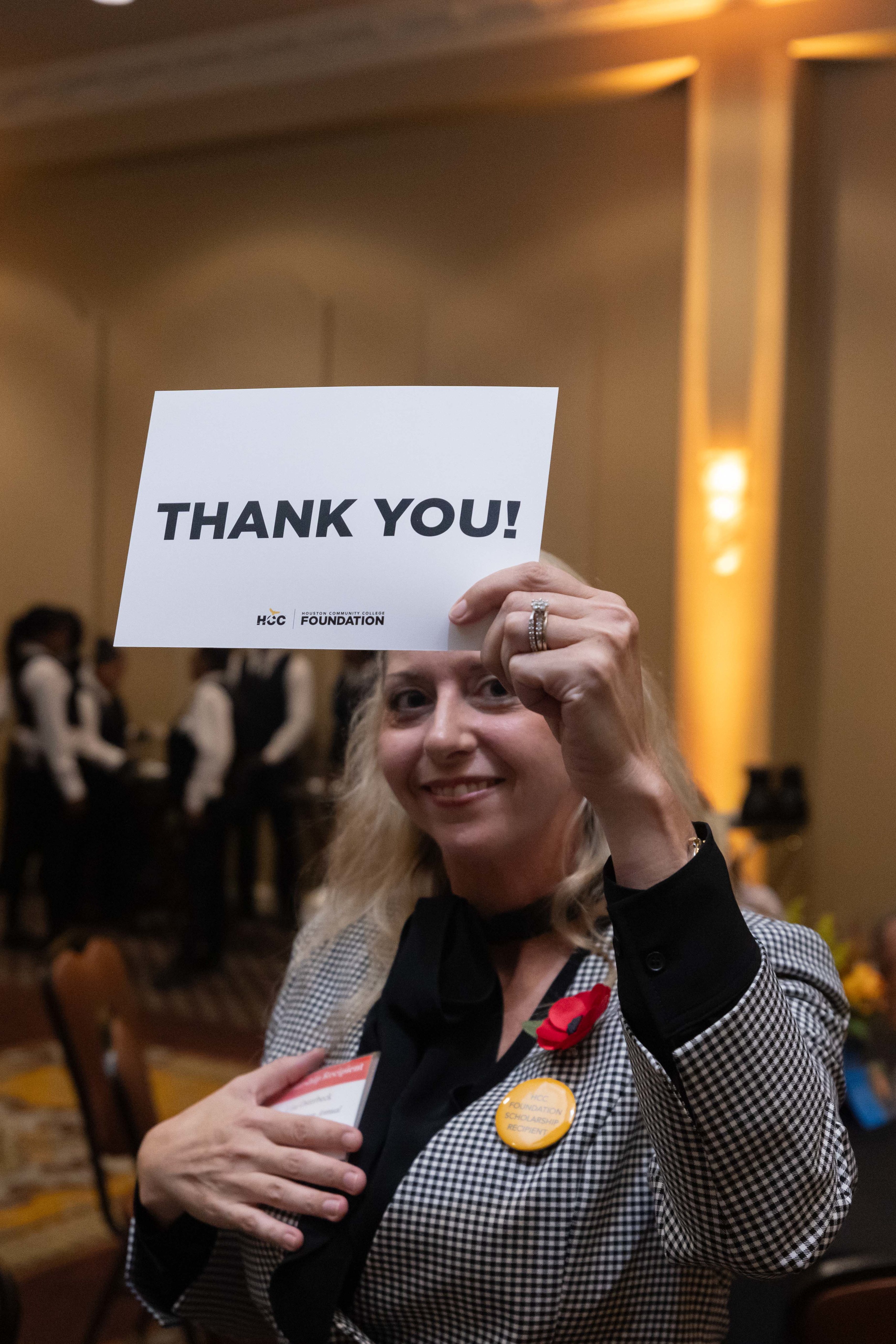 Student Holding Thank You Card